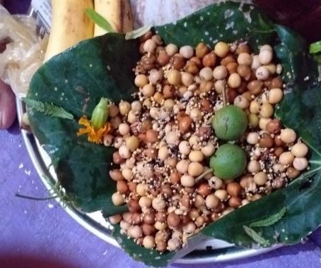 An offering (Prasad) to a local deity, made from local pulses, grains, millets and fruits.